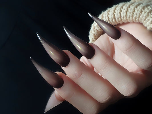 Extra-long chrome gold-pink in black claws