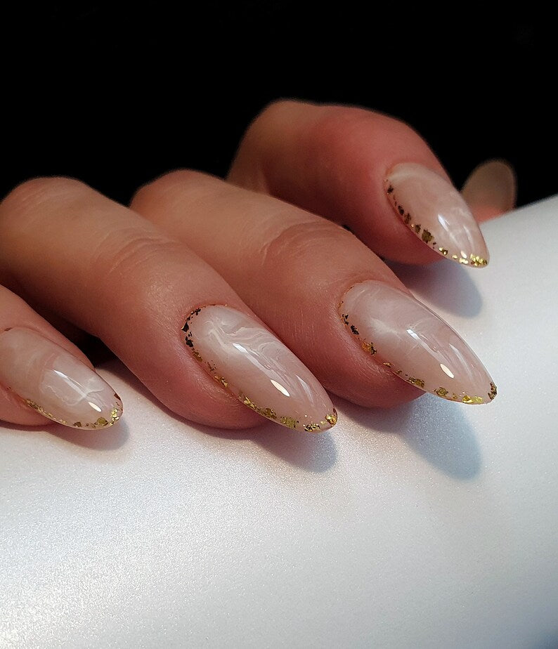 Medium Oval Beige Abstraction with Golden Accents around the Edges