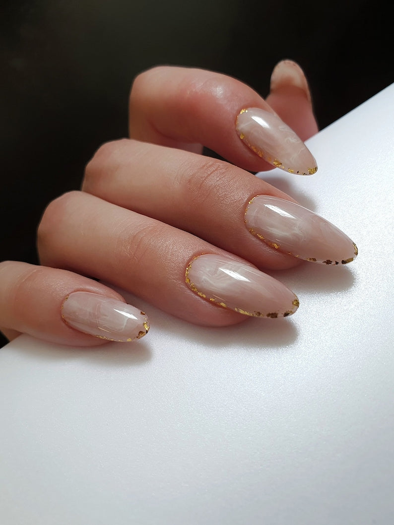 Medium Oval Beige Abstraction with Golden Accents around the Edges