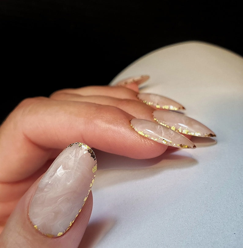 Medium Oval Beige Abstraction with Golden Accents around the Edges