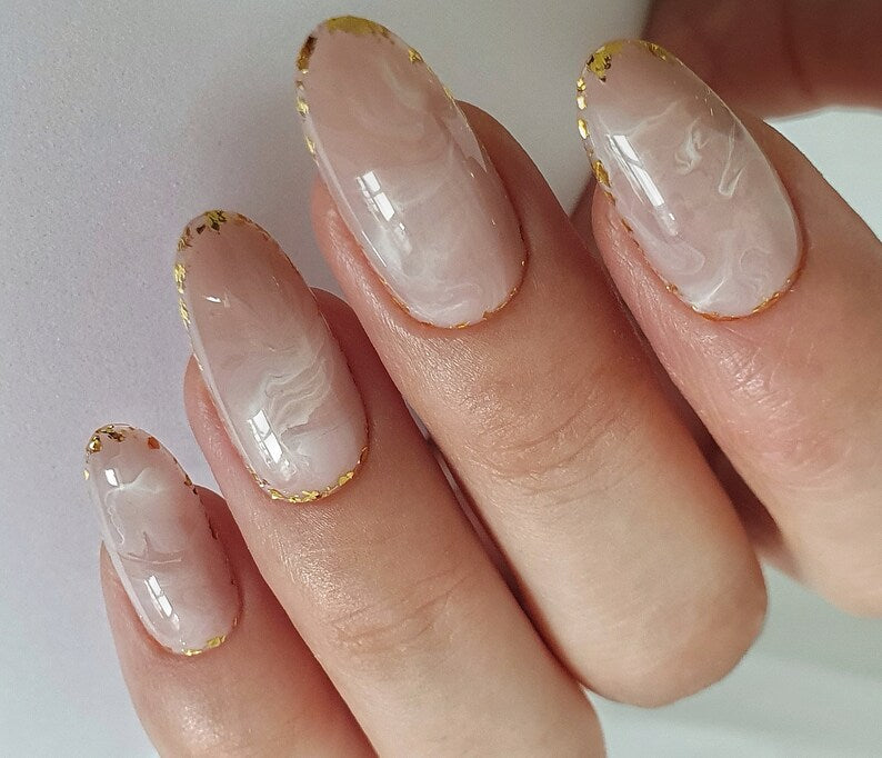 Medium Oval Beige Abstraction with Golden Accents around the Edges