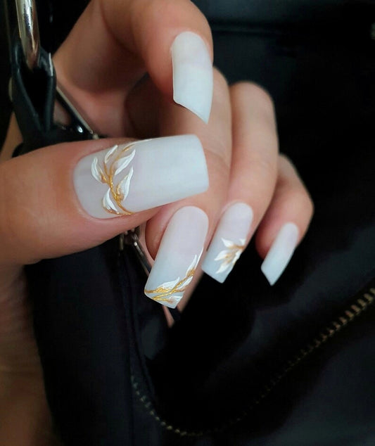 Milky White Matte Nails with a Golden White Floral Design