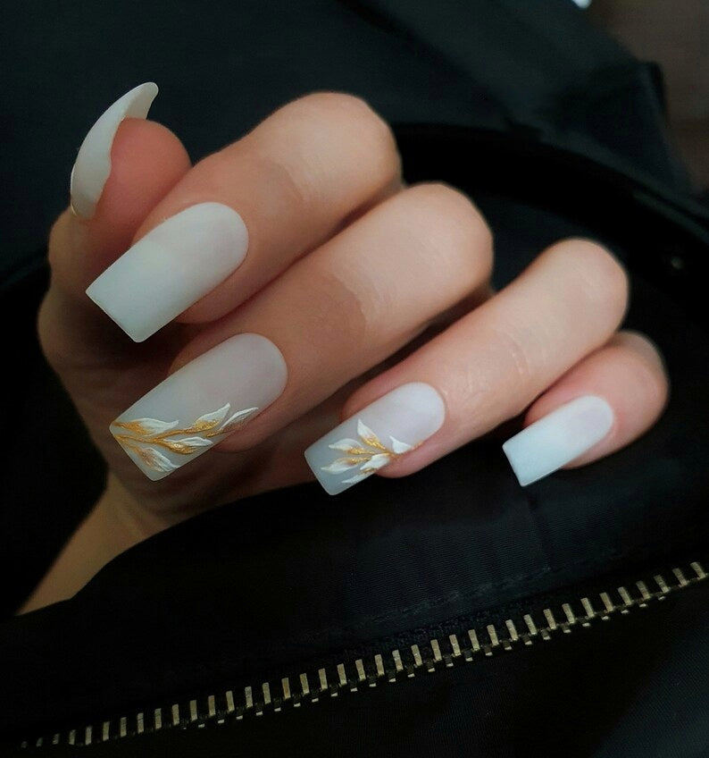 Milky White Matte Nails with a Golden White Floral Design