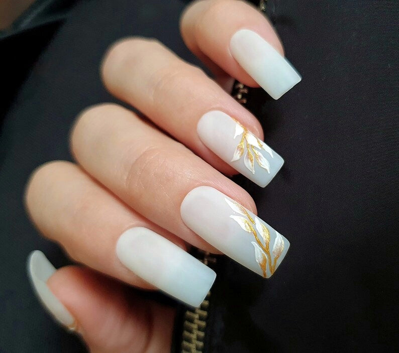 Milky White Matte Nails with a Golden White Floral Design